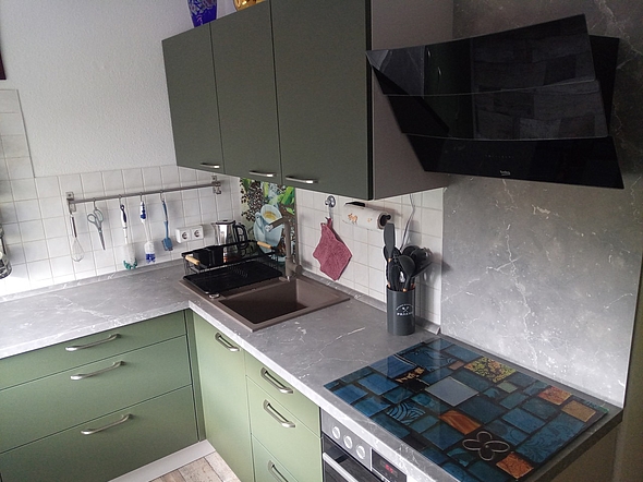 Küchenreferenz: Farbspiel & Funktionalität - Eckenansicht von der Küche aus Vogelperspektive