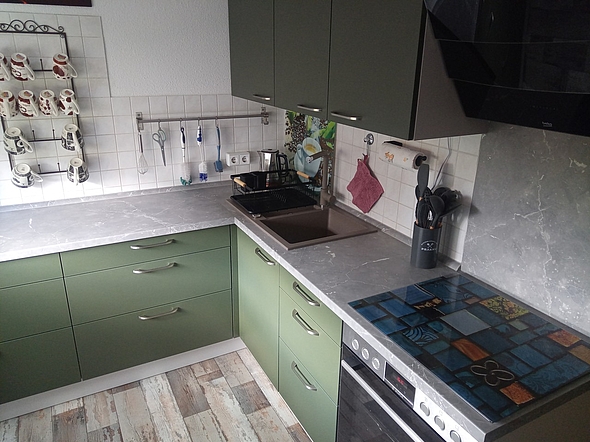 Küchenreferenz: Farbspiel & Funktionalität - Eckenansicht von der Küche